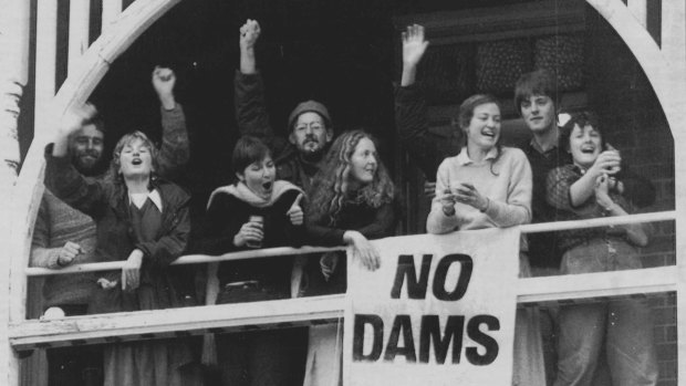 Members of Tasmanian Wilderness Society celebrate High Court decision at their Hobart head quarters.