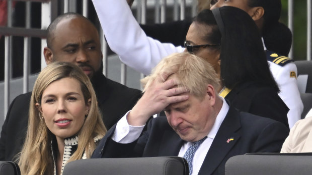 British Prime Minister Boris Johnson and his wife Carrie during the Queen’s Platinum Jubilee Pageant in London on Sunday.