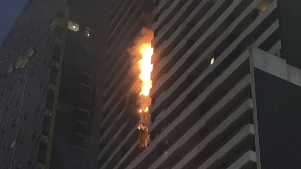 The Spencer Street apartment building that caught fire this morning is believed to be covered in combustible cladding.