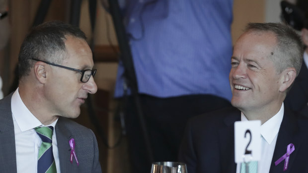 Richard Di Natale, the Greens leader (left), with Labor leader Bill Shorten at a breakfast gathering earlier this year. 