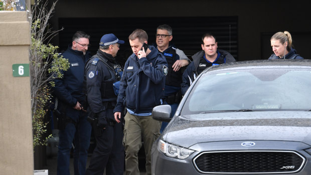 Police raid a house linked to  CFMMEU official Derek Christopher on Friday morning.