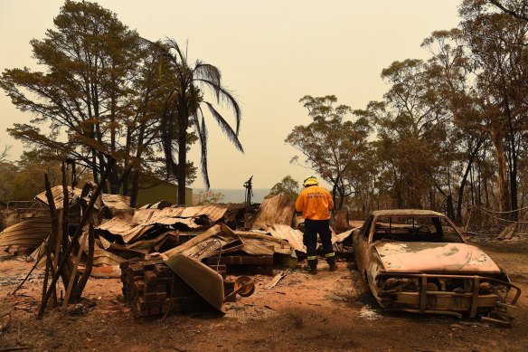 RFS assessors at a burnt out home at Balmoral 