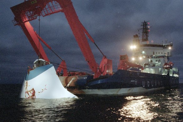 The bow door of the sunken passenger ferry Estonia is lifted up from the bottom of the sea, in 1994.