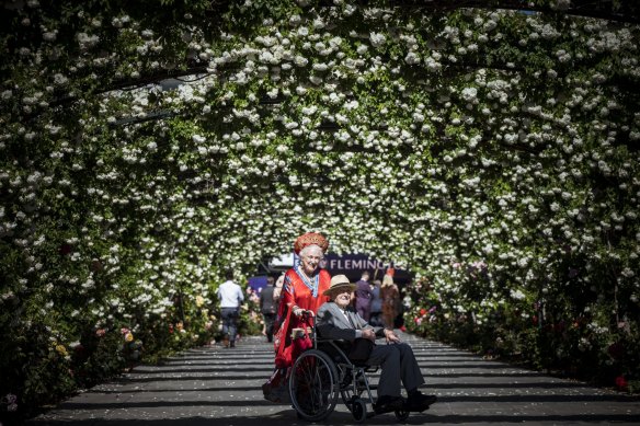 100-year-old Richard Waycott and his wife Jane arrive at Flemington. 