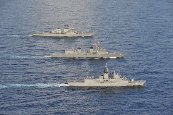 Australian, US and Japanese warships sail together in the South China Sea. The US wants to step up activity with its allies in the region.