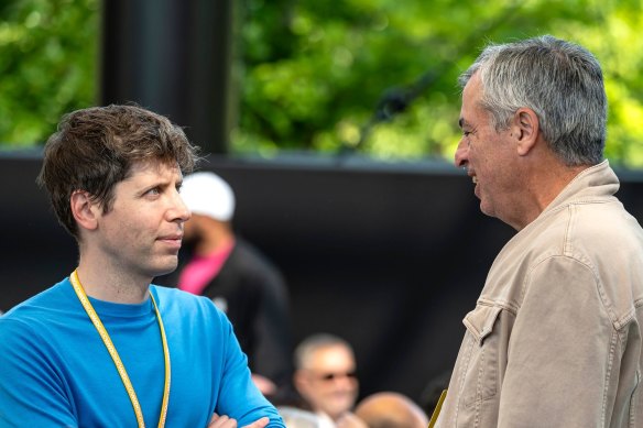OpenAI chief executive Sam Altman, with Apple services boss Eddy Cue, at WWDC.