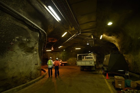 Bondi Waste Water Treatment Production Team Leader (right) walks through one of the underground tunnels at Sydney Water Bondi Waste Water Treatment Plant. 