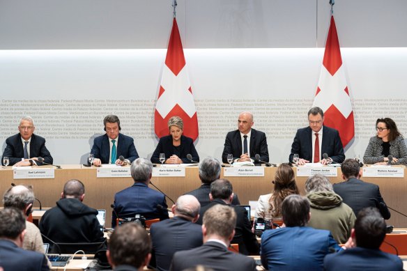 Key figures at a Bern press conference on Sunday (from left): Credit Suisse chairman Axel Lehmann, UBS chairman Colm Kelleher, Swiss Finance Minister Karin Keller-Sutter, Swiss President Alain Berset, Swiss National Bank president Thomas Jordan and Marlene Amstad, the chair of the Swiss Financial Market Supervisory Authority.