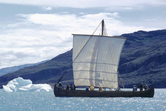 A Viking replica longship sails across a fjord in Greenland in 1997 en route to North America, following the same route as Leif Erikson 1000 years earlier.