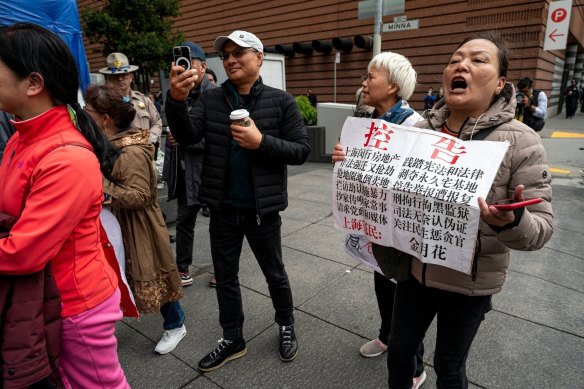 Protesters outside San Francisco’s St Regis Hotel on the sidelines of the APEC forum. 