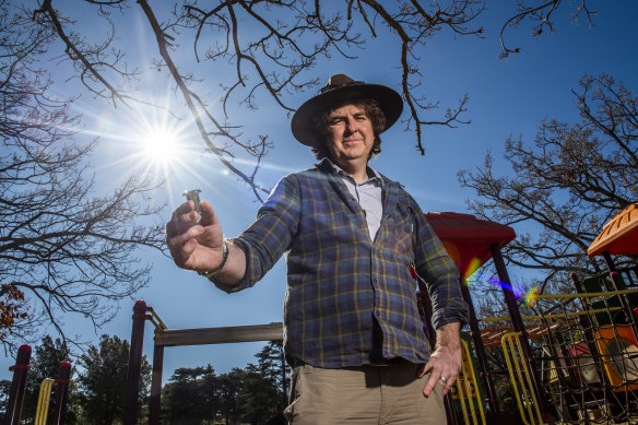 Radiation scientist Nathan Downs –pictured holding a whole-sky imaging device – has spent more than 20 years studying Queensland’s UV index. 