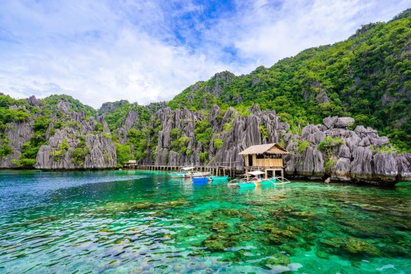 Forget flying: opt for a picturesque sail by Palawan’s aqua shoreline in the Philippines.