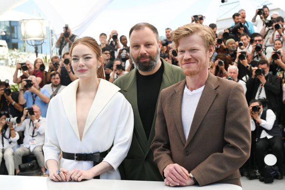 Emma Stone, Yorgos Lanthimos and Jesse Plemons at a photo call for <i>Kinds of Kindness</i> at Cannes. 