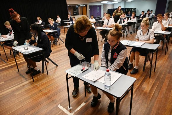 Year 12 students of 2020 at Penola Catholic College after completing their English HSC exam which was collected by gloved teaches. 