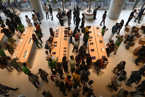 Customers inside the new Apple store in Mumbai, India.