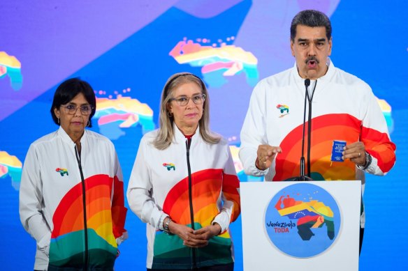 Venezuelan President Nicolas Maduro with first lady Cilia Flores, centre, and Vice President Delcy Rodrigues.
