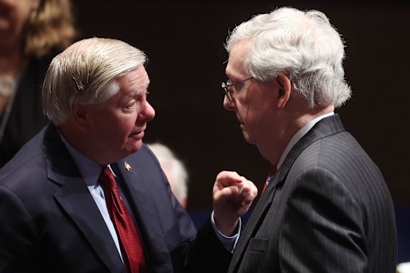 Senator Lindsey Graham (left) speaks with Senate Minority Leader Mitch McConnell before Ukrainian First Lady Olena Zelenska's 2022 speech in Washington, D.C. 