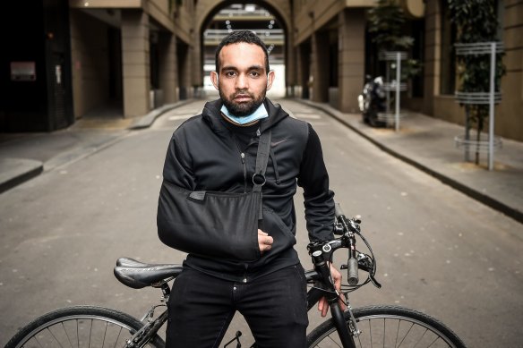 Korey Penny, pictured in September last year, is suing over alleged police brutality after he was arrested while riding to work on St Kilda Road. 