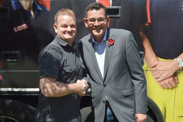 Cheers, mate! Plumbers’ union secretary Earl Setches with Victorian Premier Daniel Andrews.