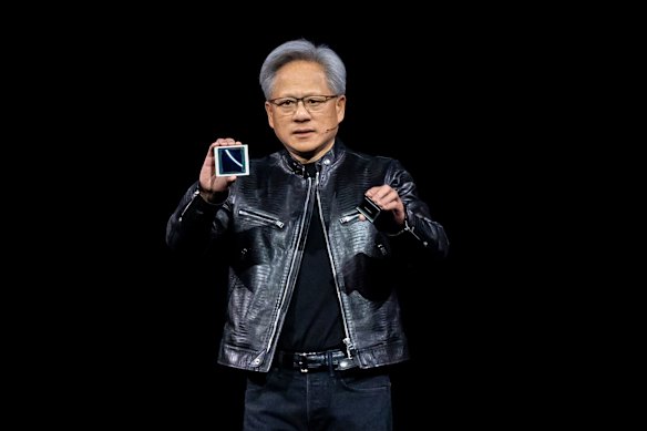 Nvidia chief executive Jensen Huang with a Blackwell GPU chip at a technology conference in California last year.