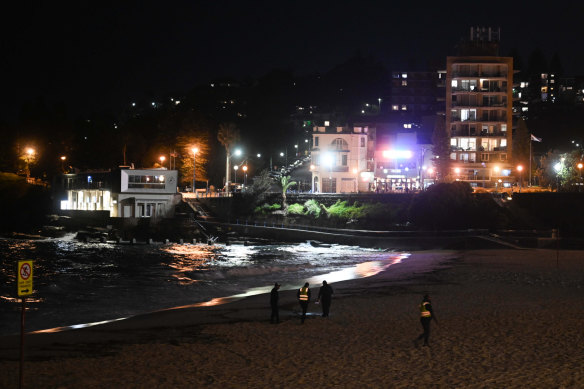 Randwick City Council officers on Coogee Beach for the clean-up operation.