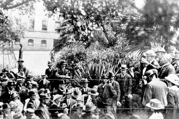 Around 200 people from interstate who were left stranded in Victoria after state border were closed gathered at Melbourne's Treasury Gardens on February 4, 1919.