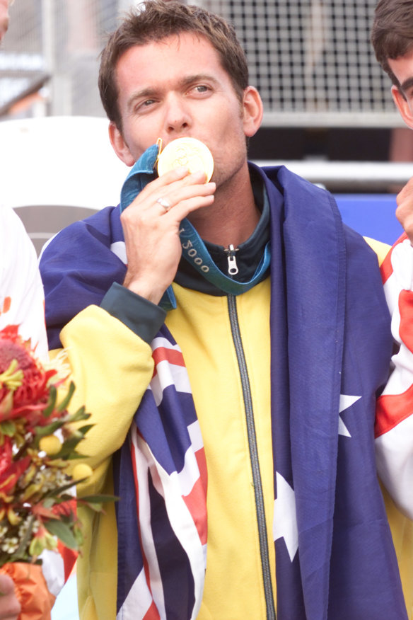 Simon Fairweather enjoys his gold medal.