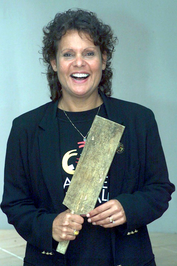 In 1999 with a replica of her first tennis “racquet”.