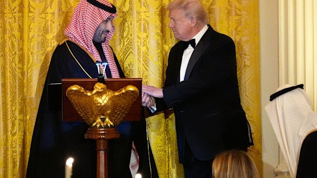 President Donald Trump shakes hands with Saudi Arabia’s Crown Prince Mohammed bin Salman.