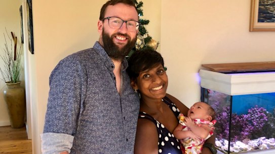 Kevin and Manu O'Connor with their baby Sita at their Croydon home.