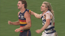 Bailey Smith tugs at James Peatling's jersey