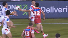 Isaiya Katoa gets his hand to a Valentine Holmes pass.