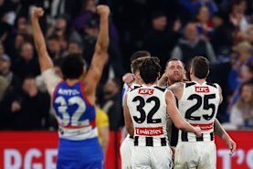 Arty Jones celebrates while Tim Membrey was consoled by his teammates.