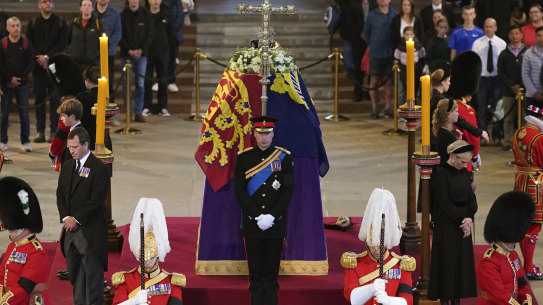 Prince William leads the vigil of the Queen’s grandchildren on Saturday in London.