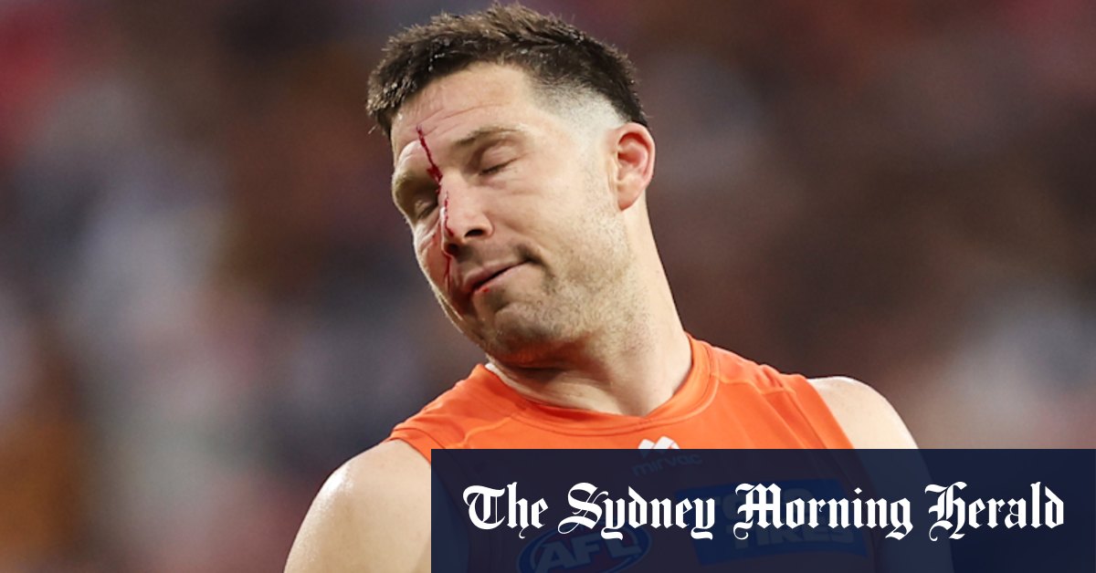 Hawthorn withstand ‘Orange Tsunami’ to send Giants packing