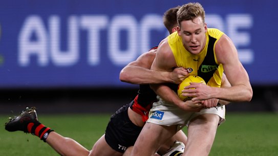Tom Lynch booted all five of his goals after half-time against Essendon but finished injured and on the bench.