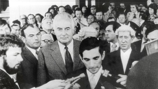 Watched by Gough Whitlam. David Smith, official secretary to the governor-general, reads the proclamation dissolving parliament following the dismissal of the Whitlam government in 1975.