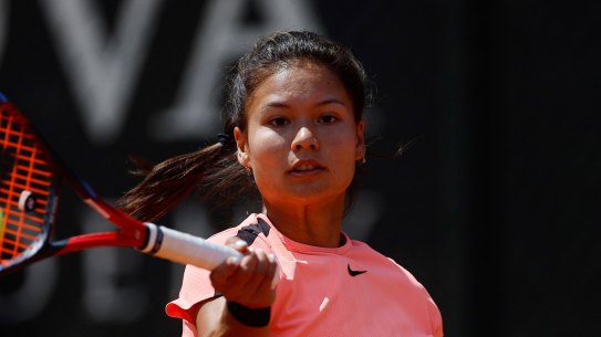  Hungary’s Amarissa Toth rubbed out a mark on the court with her foot.