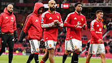 Manchester United players leave the pitch after losing the English Premier League soccer match between Manchester United and Bournemouth in Manchester, England, Sunday, Oct. 25, 2026. (AP Photo/Dave Thompson)