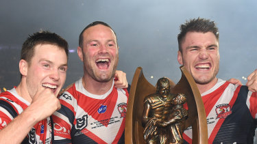 Luke Keary, Boyd Cordner and Angus Crichton of the Roosters celebrate their NRL win.