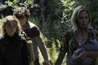 Regan (Millicent Simmonds), Marcus (Noah Jupe) and Evelyn (Emily Blunt) brave the unknown in A Quiet Place Part II.