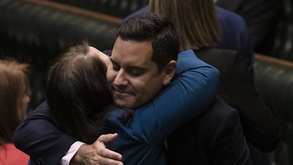 Independent MP Alex Greenwich is congratulated by Liberal MP Felicity Wilson after the passing of the bill to decriminalise abortion.