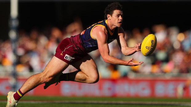 Lending a hand: Brisbane's Brownlow Medal favourite Lachie Neale in action against the Saints at The Gabba on Sunday.