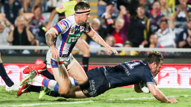 Game over: Gavin Cooper scores the match-winning try, set up by Johnathan Thurston.