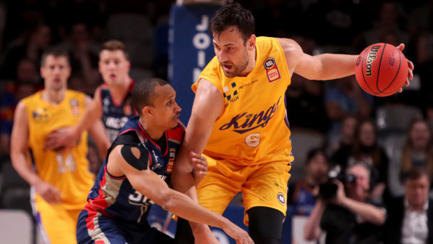 Size advantage: Andrew Bogut wards off Adris Deleon of the 36ers at Titanium Security Arena in Adelaide.