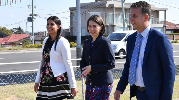 Premier Gladys Berejiklian is flanked by Roads Minister Andrew Constance, right, and Miranda MP Eleni Petinos
at an announcement on Tuesday for expressions of interest for construction of the motorway.
