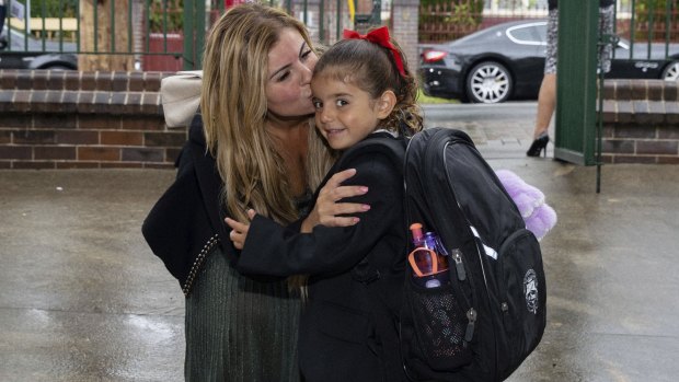 Parents can drop children off on the school grounds but must be wearing a mask.