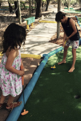Mini golf is a hit with the kids.