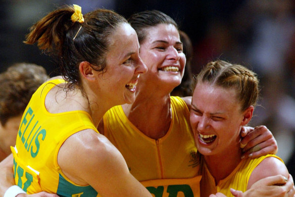 From left: Australian netballers Liz Ellis, captain Kathryn Harby-Williams and Sharelle McMahon embrace after their gold medal victory against New Zealand in the women’s’ netball final at the 2002 Commonwealth Games in Manchester.