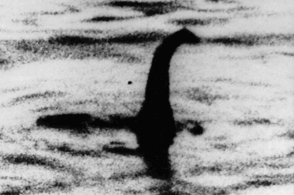 This photo of a shadowy shape that some people say is the Loch Ness monster in Scotland was later debunked as a hoax. 